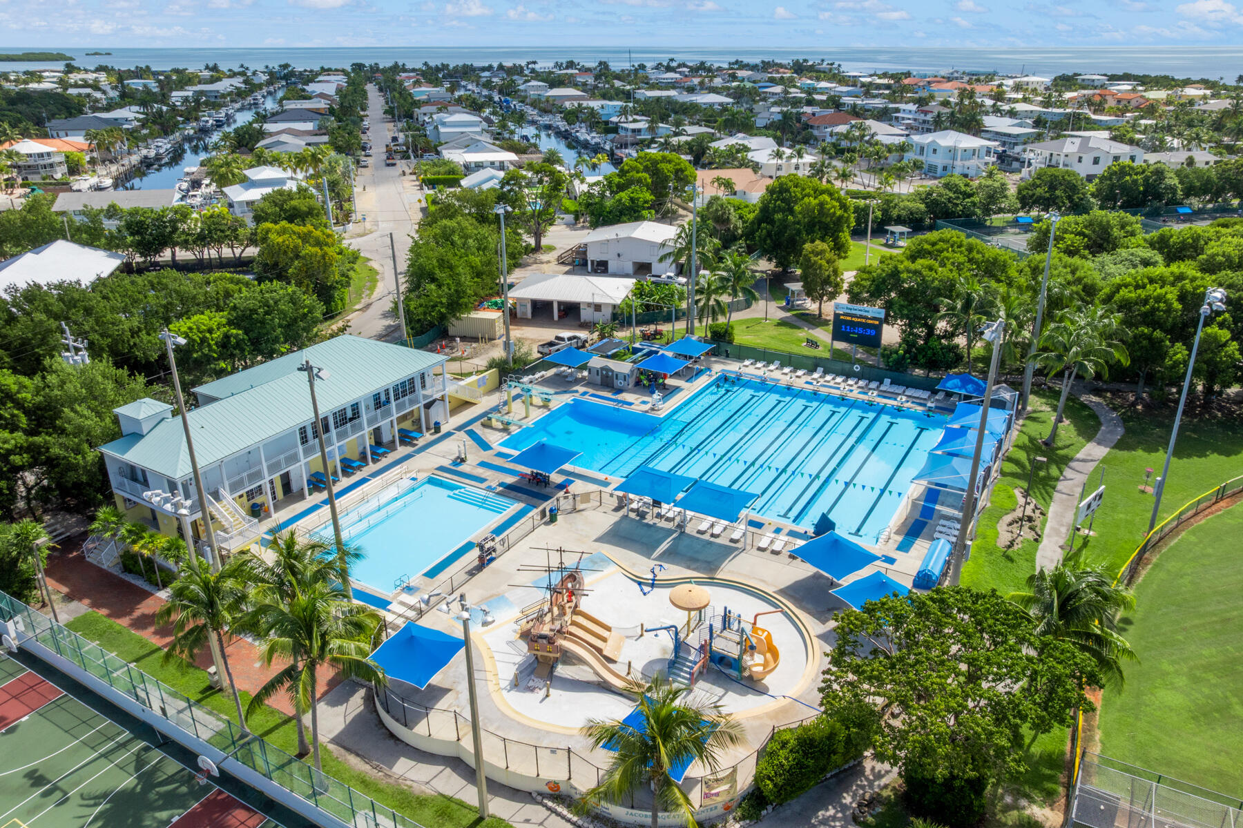 184 Bahama Avenue Key Largo, FL 33037 - Photo 64 of 72 an aerial view of a house with a swimming pool yard and outdoor seating