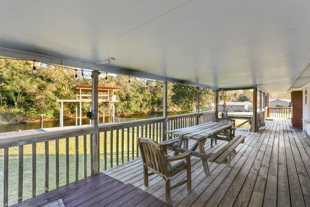 a view of balcony with wooden floor