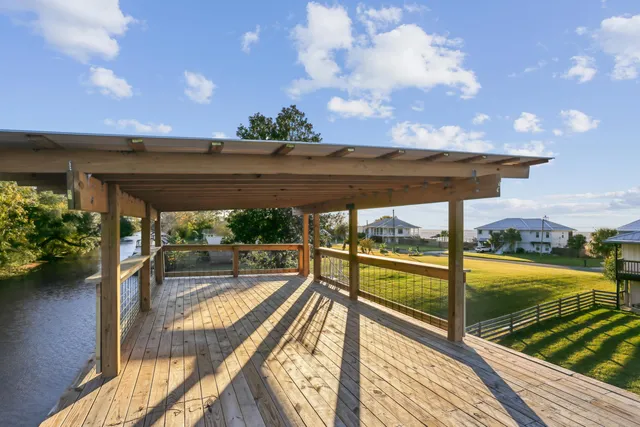 a view of a balcony with dining area