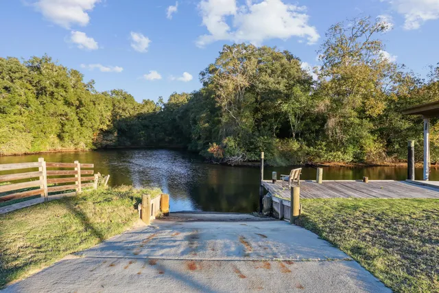 a view of a lake with a big yard