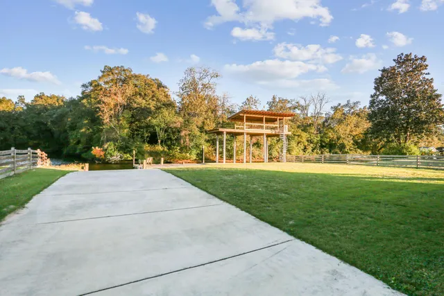 a view of building with yard