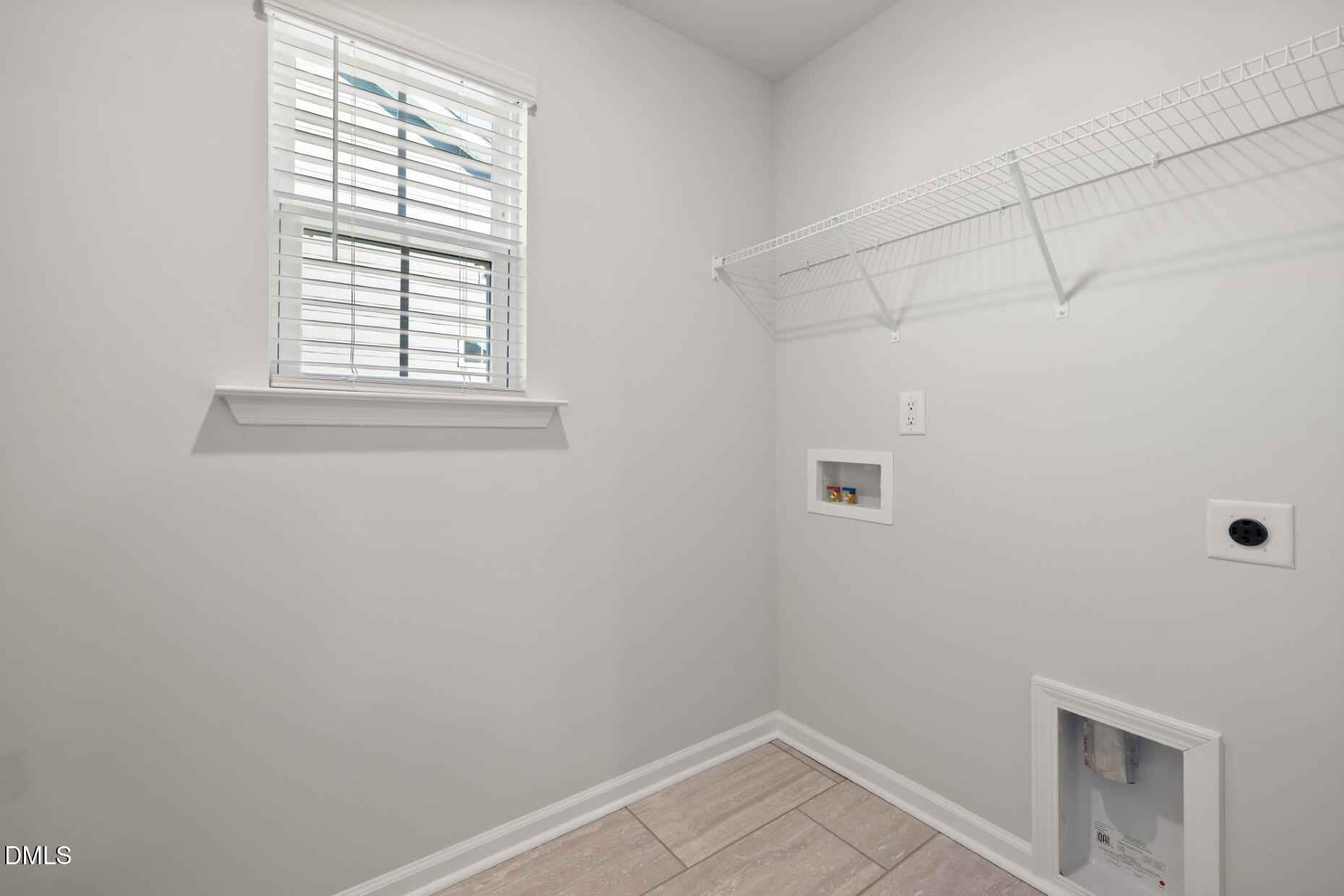 204 Armorial Court Willow Spring, NC 27592 - Photo 24 of 26 a view of a room that has a window in it