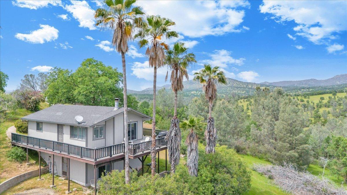 a view of a house with a garden