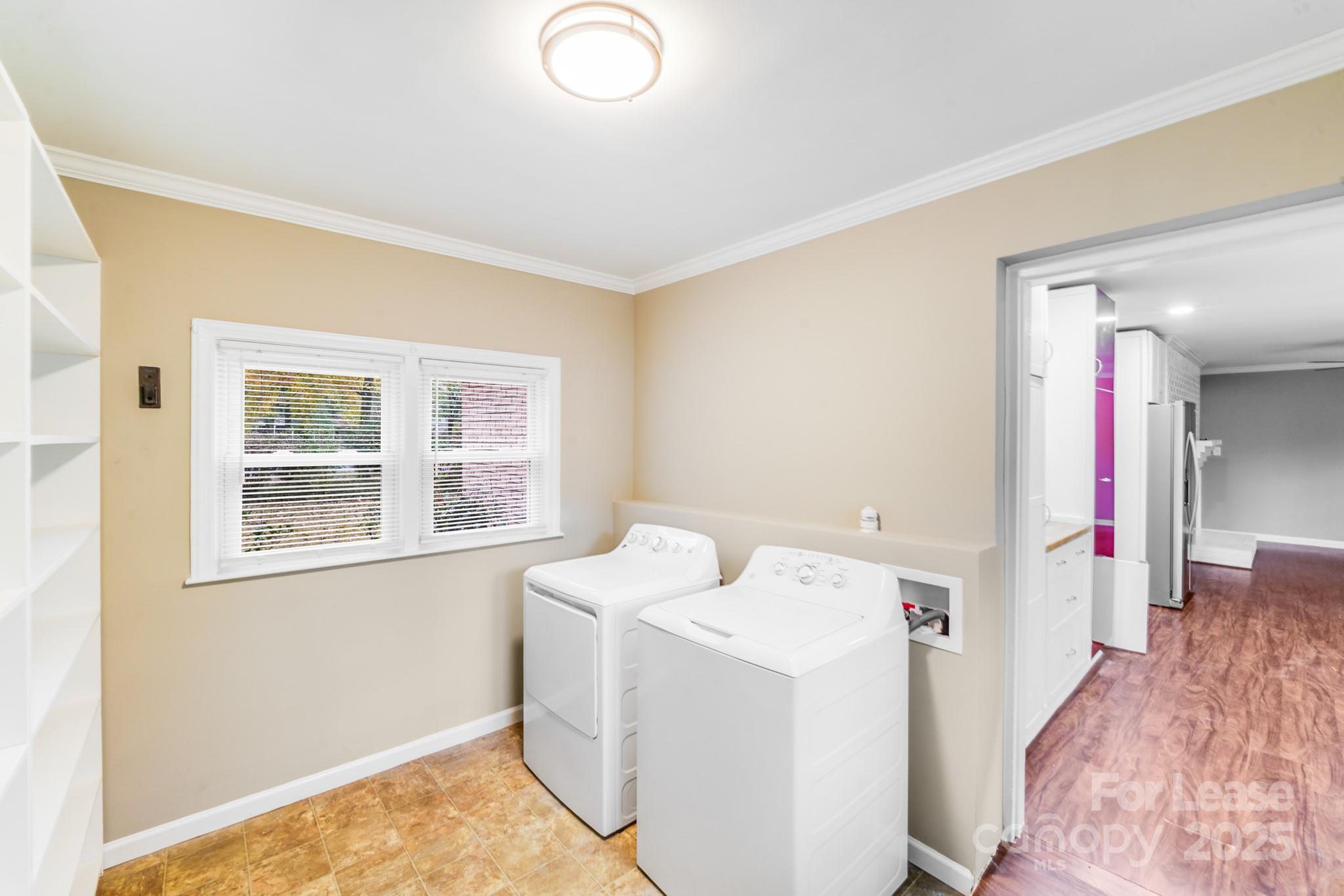 5600 Riviere Drive Charlotte, NC 28211 - Photo 26 of 35 a utility room with dryer and washer