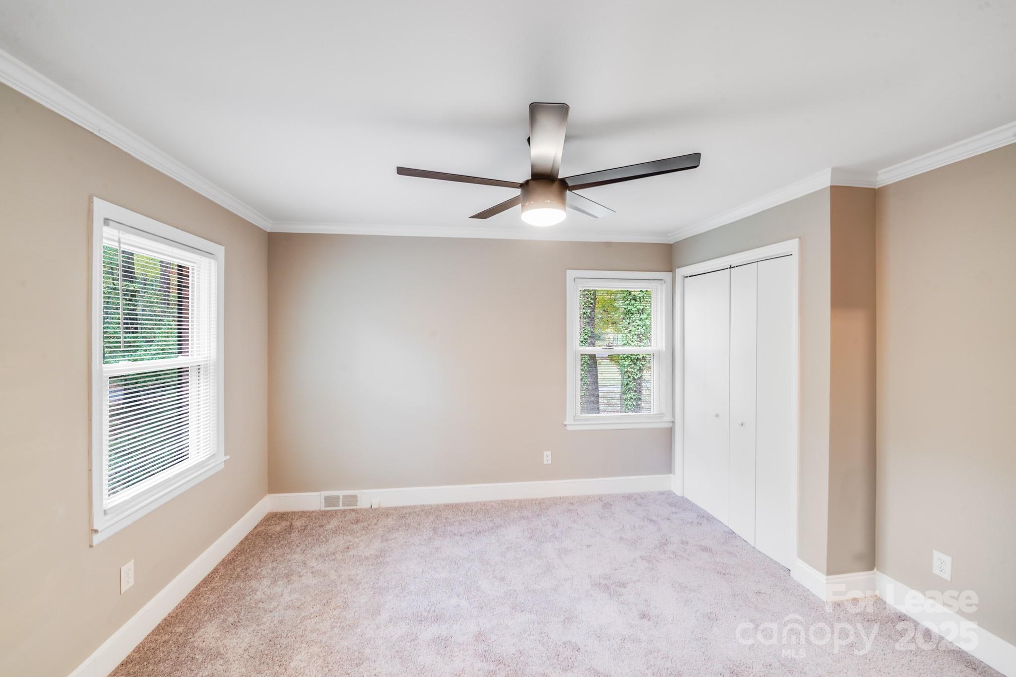 5600 Riviere Drive Charlotte, NC 28211 - Photo 5 of 35 a view of an empty room with a window