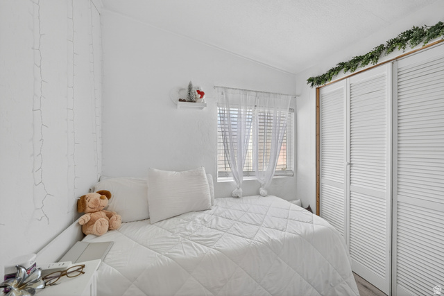 160 Cushing Way Layton, UT 84041 - Photo 22 of 23 Bedroom featuring white walls and a window with horizontal blinds