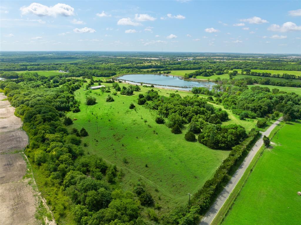 318 Cold Springs Road Van Alstyne, TX 75495 - Photo 12 of 17 a view of a green field with lots of green space in it