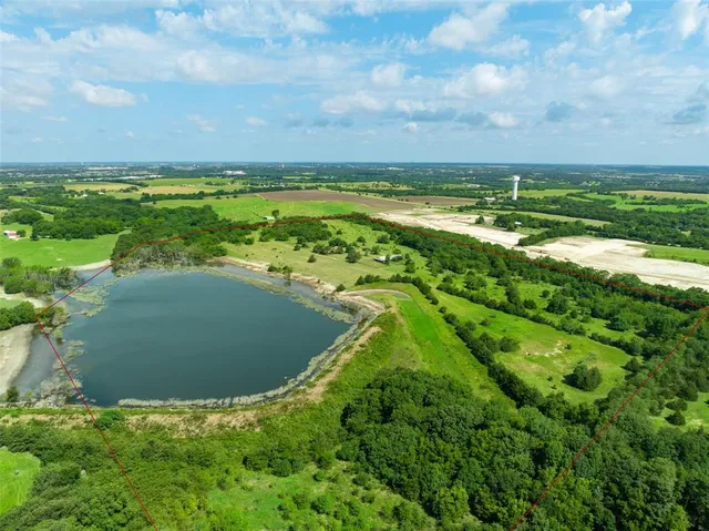a view of a lake with a big yard