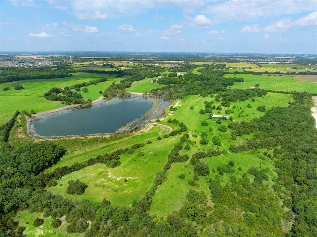 318 Cold Springs Road Van Alstyne, TX 75495 - Photo 8 of 17 a view of a field with an ocean