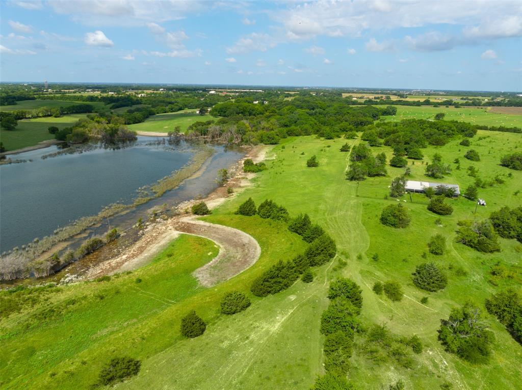 318 Cold Springs Road Van Alstyne, TX 75495 - Photo 10 of 17 a view of a lake with a city