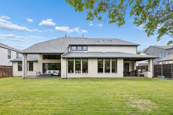 a view of a house with a swimming pool