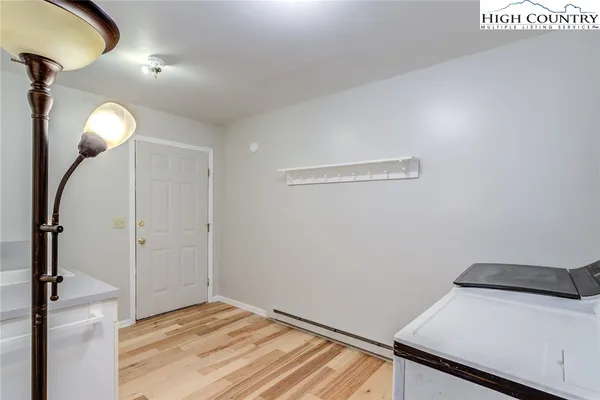 a kitchen with a sink cabinets and appliances