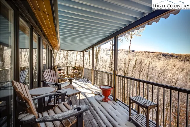 a view of a two chair in the balcony