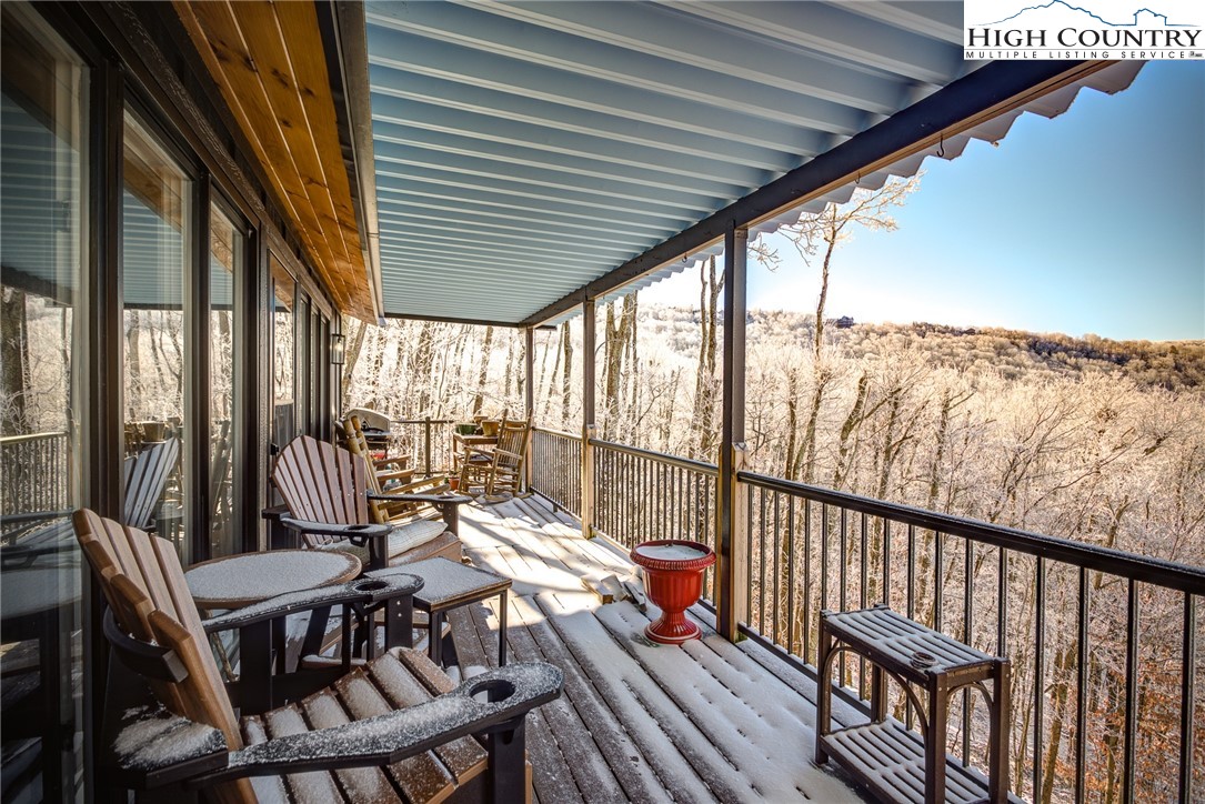 523 Pine Ridge Road Beech Mountain, NC 28604 - Photo 35 of 42 a view of a balcony with furniture