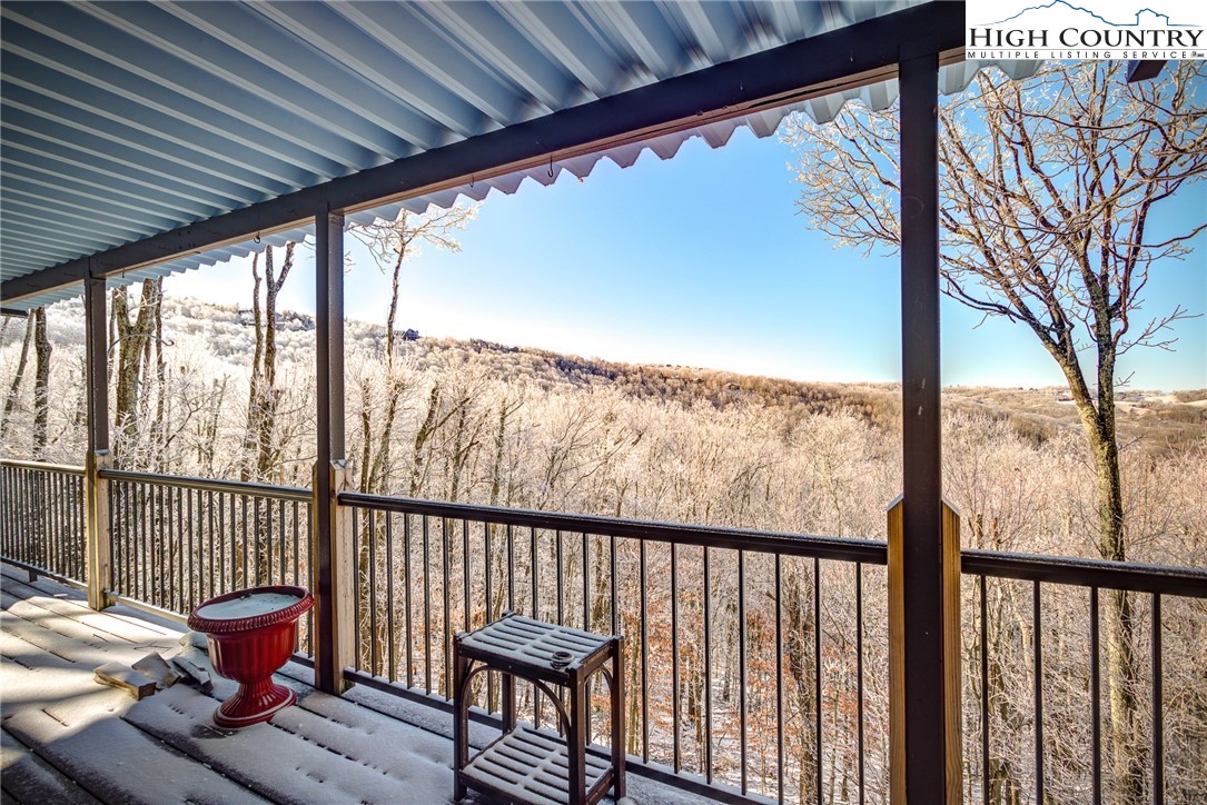 523 Pine Ridge Road Beech Mountain, NC 28604 - Photo 38 of 42 a view of a two chair in the balcony