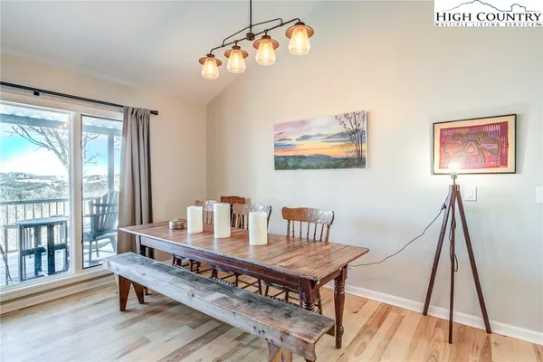 a view of a dining room with furniture