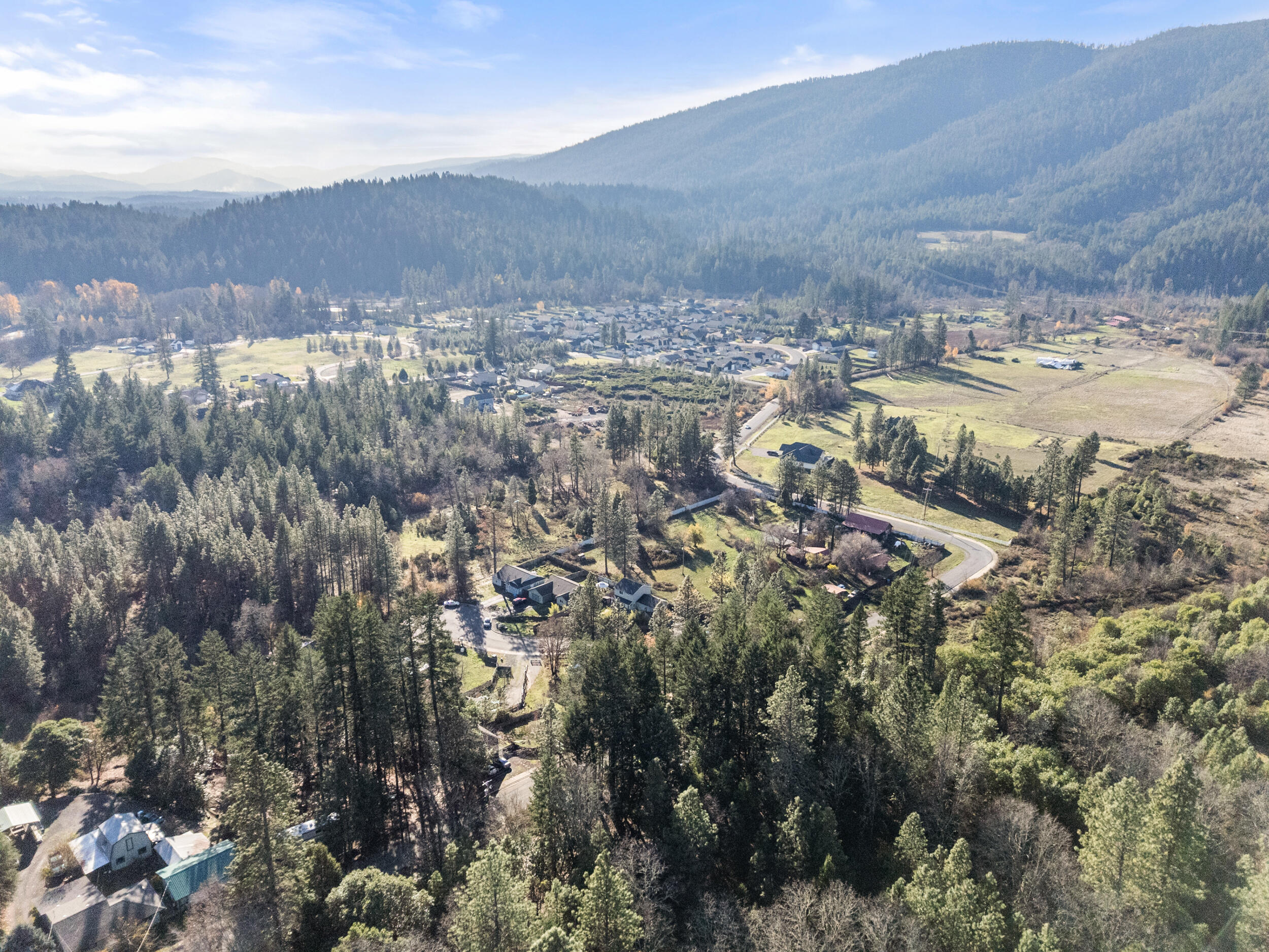 681 Daisy Hill Road Cave Junction, OR 97523 - Photo 8 of 26 a view of city and mountain