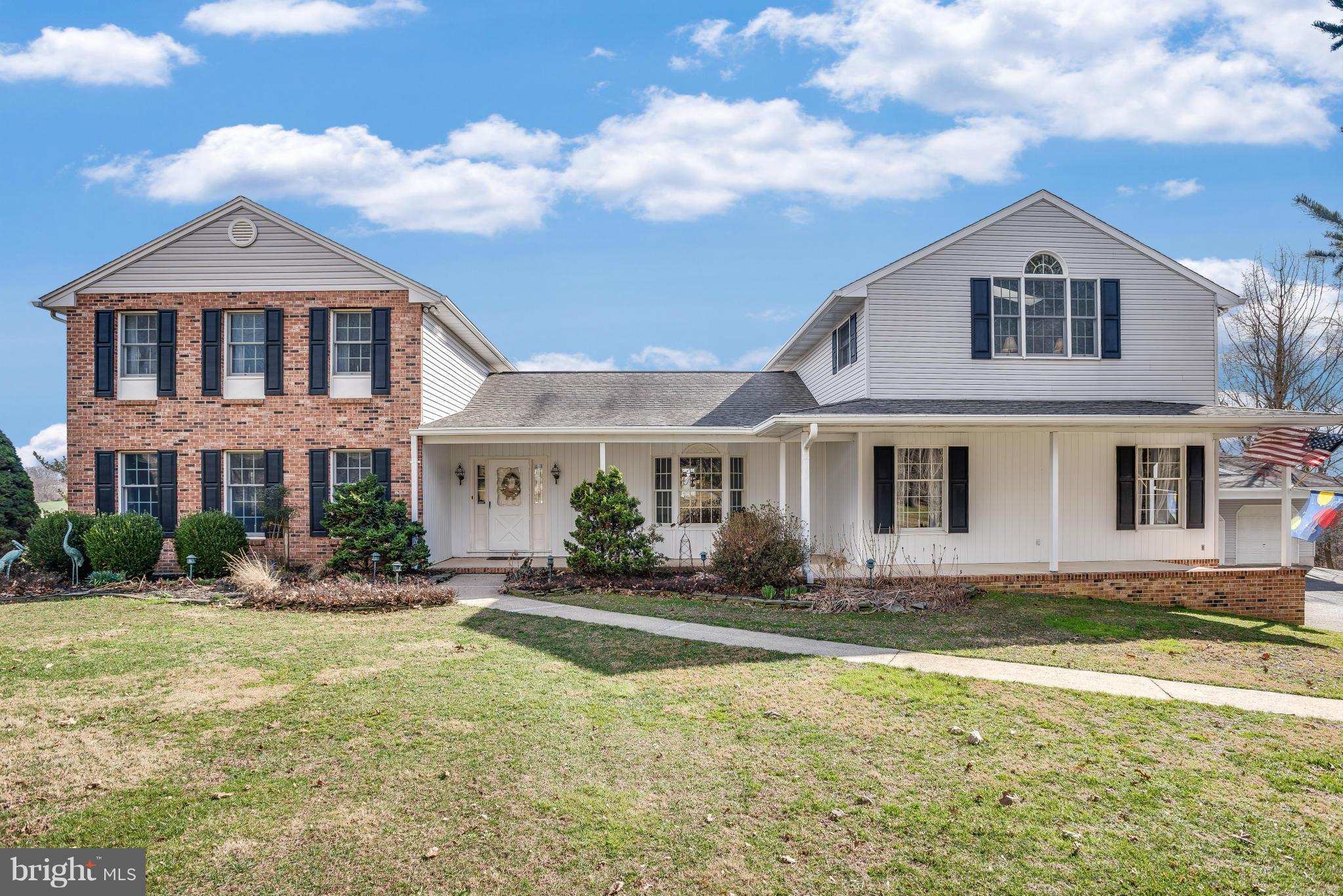 19003 Graystone Road White Hall, MD 21161 - Photo 1 of 21 a front view of a house with a yard