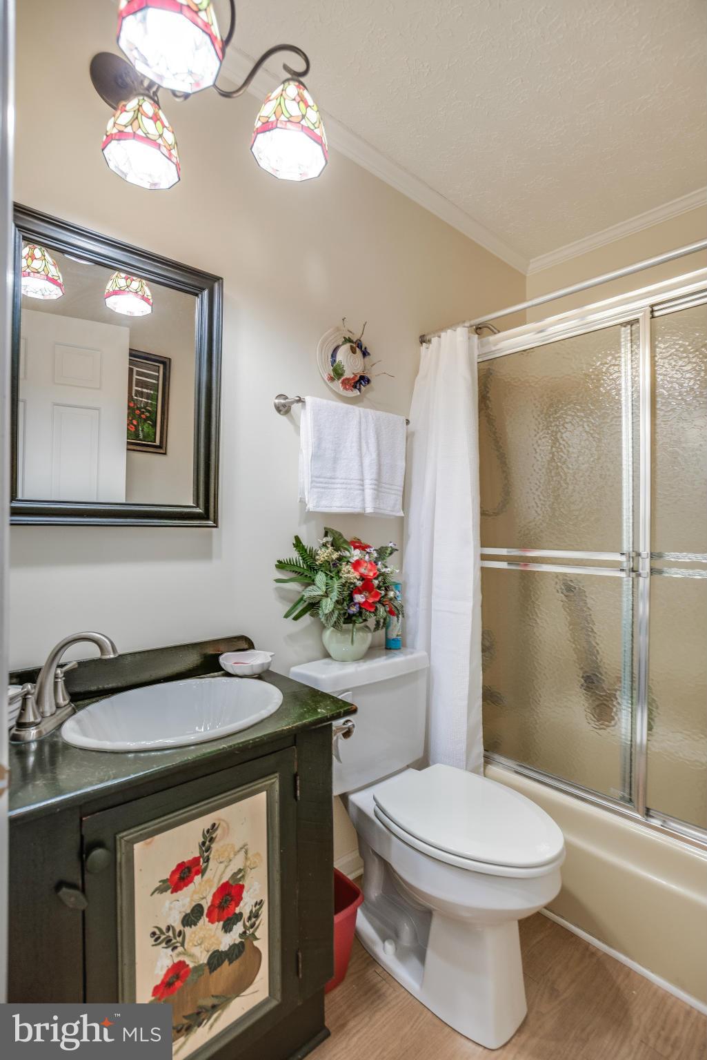 19003 Graystone Road White Hall, MD 21161 - Photo 15 of 21 a bathroom with a sink a toilet and a shower