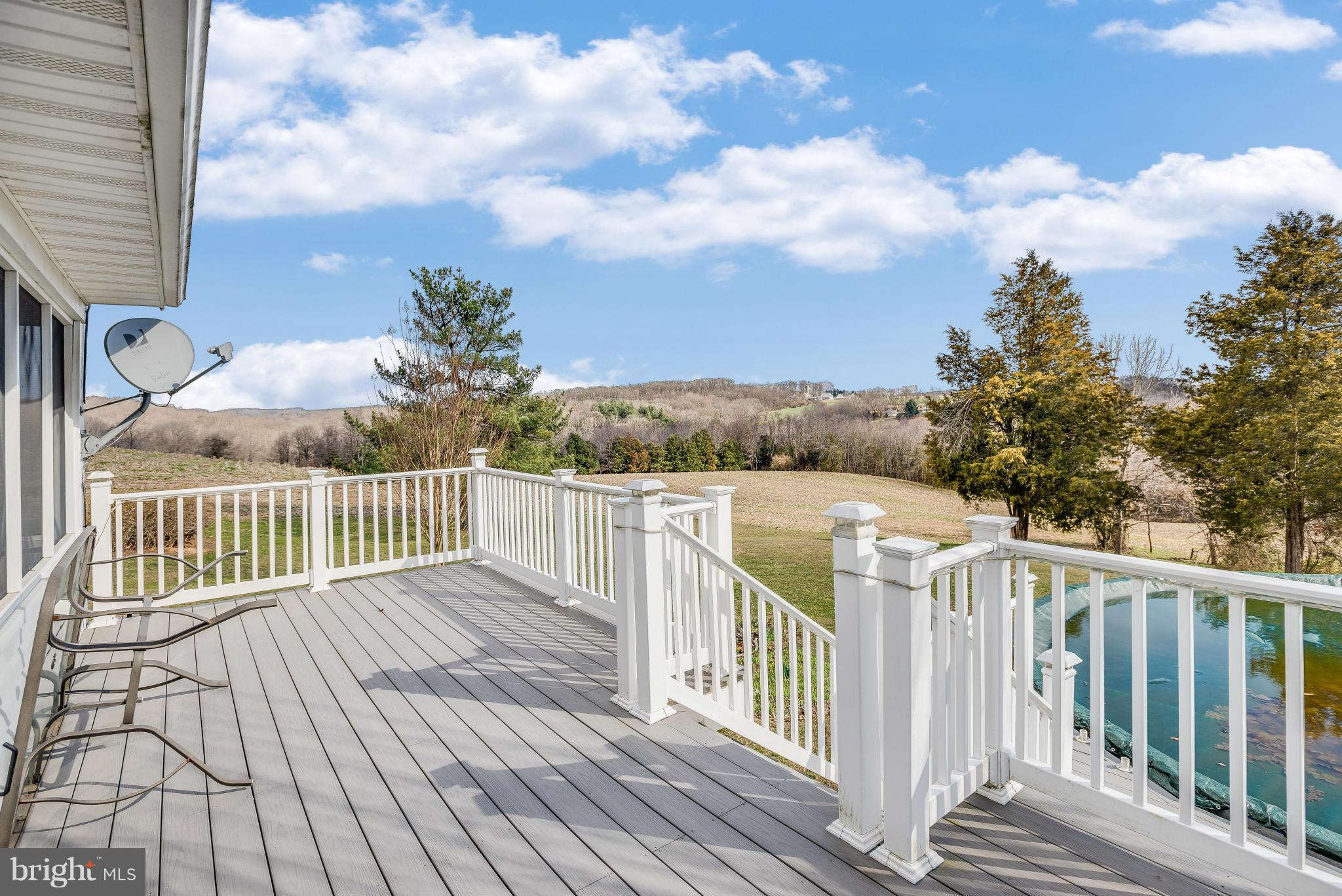 19003 Graystone Road White Hall, MD 21161 - Photo 17 of 21 a view of a balcony with wooden fence