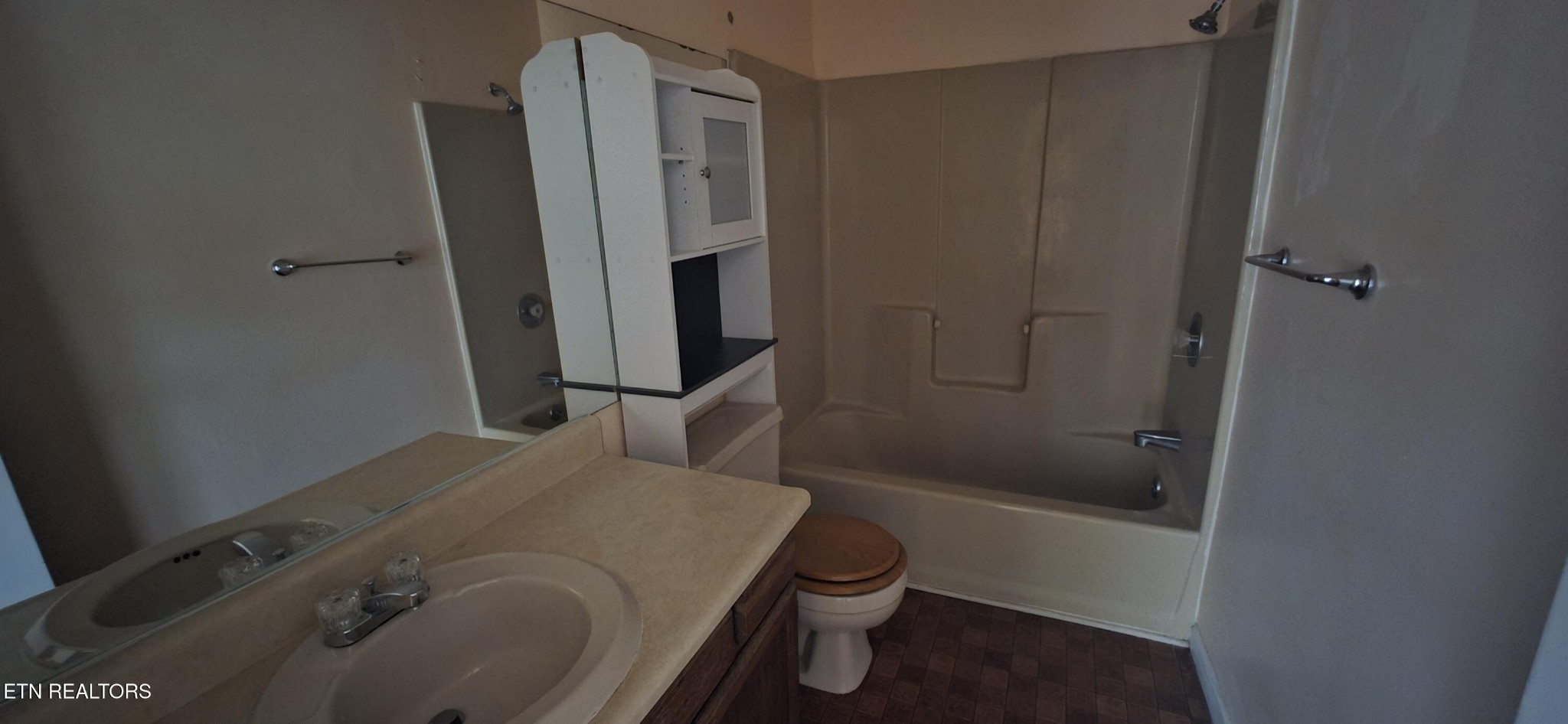 113 High Point Lane Oak Ridge, TN 37830 - Photo 13 of 24 a bathroom with a sink a toilet and shower