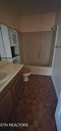 a bathroom with a sink and a toilet