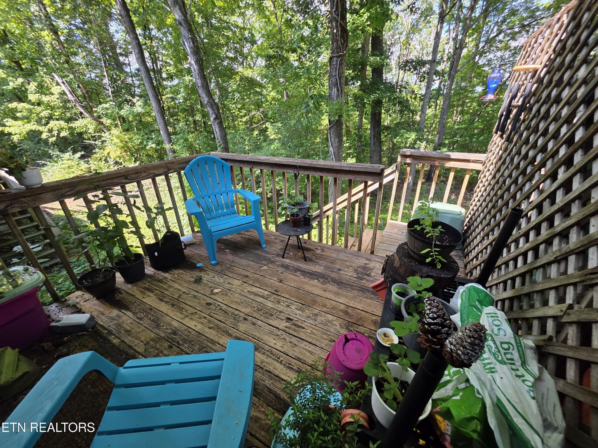 113 High Point Lane Oak Ridge, TN 37830 - Photo 21 of 24 a view of a wooden deck with chairs