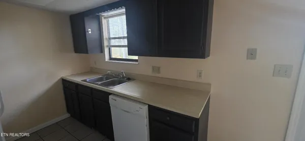 a utility room with a sink