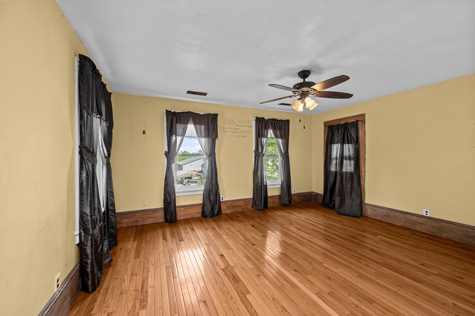 200 West Locust Street Cambridge, IL 61238 - Photo 27 of 32 wooden floor in an empty room with a window