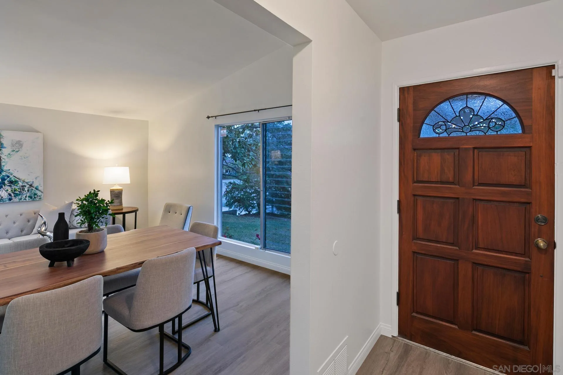 916 Crest Drive Encinitas, CA 92024 - Photo 12 of 47 a dining room with furniture and window