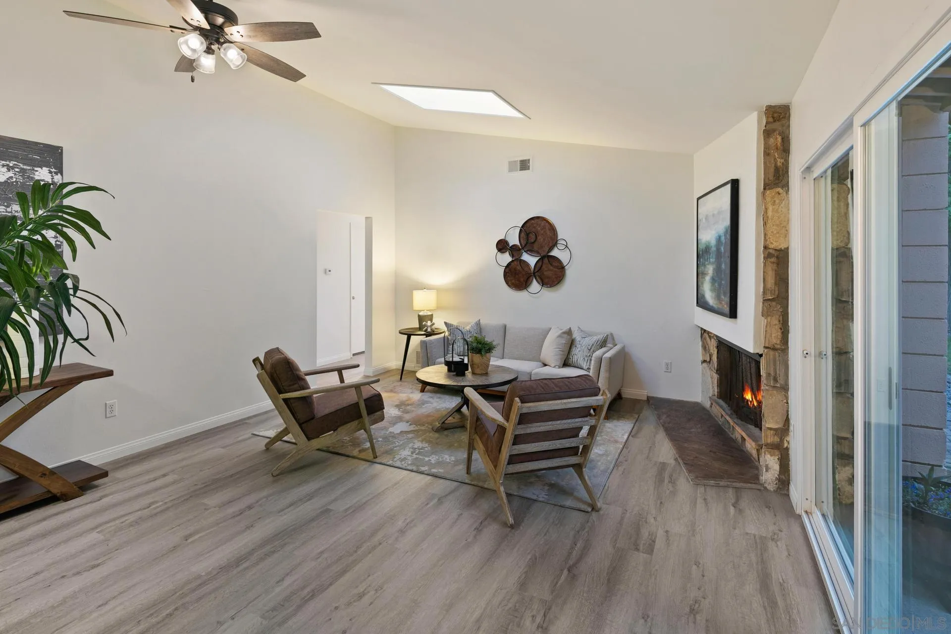 916 Crest Drive Encinitas, CA 92024 - Photo 15 of 47 a living room with furniture and a wooden floor