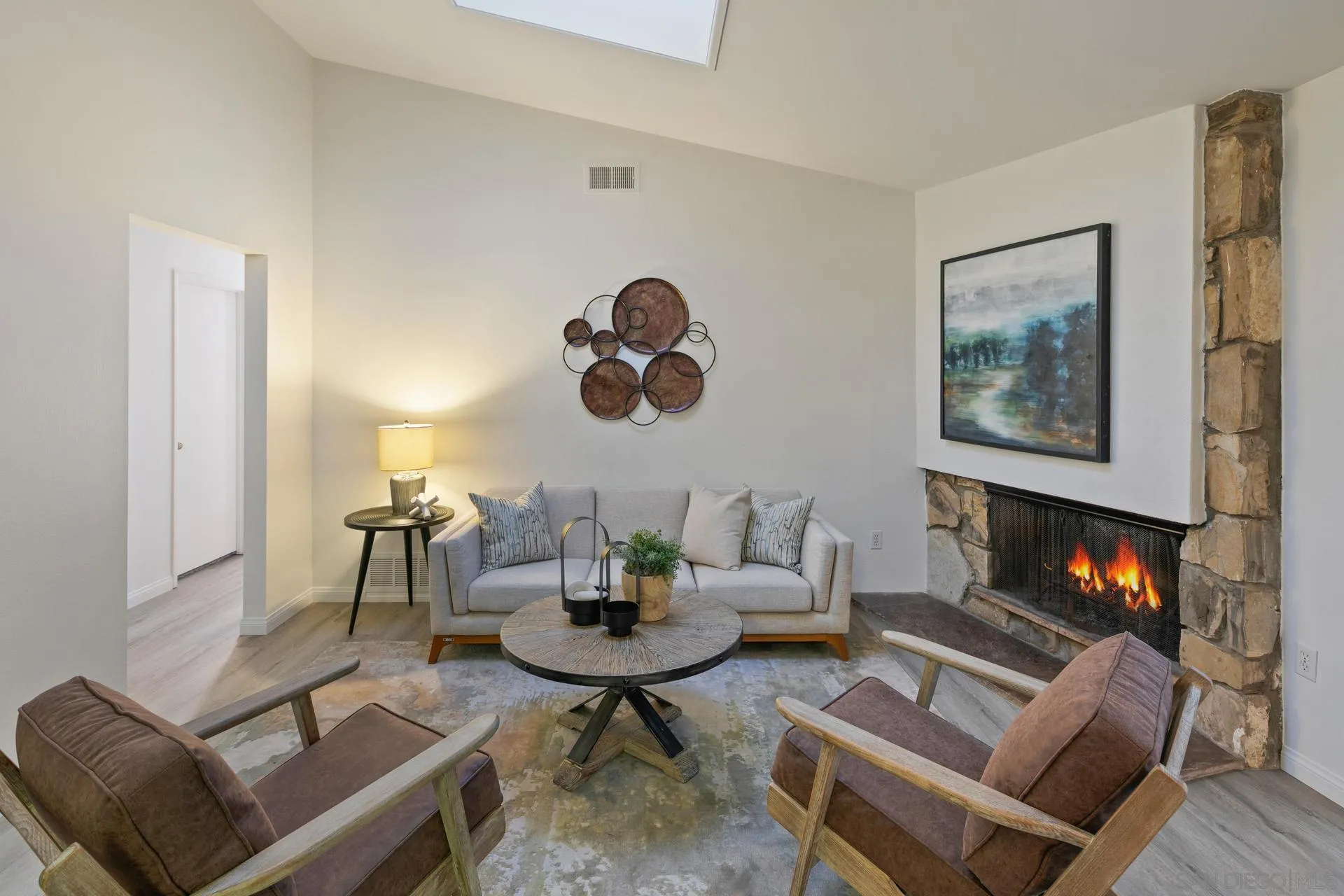 916 Crest Drive Encinitas, CA 92024 - Photo 16 of 47 a living room with furniture and a fireplace