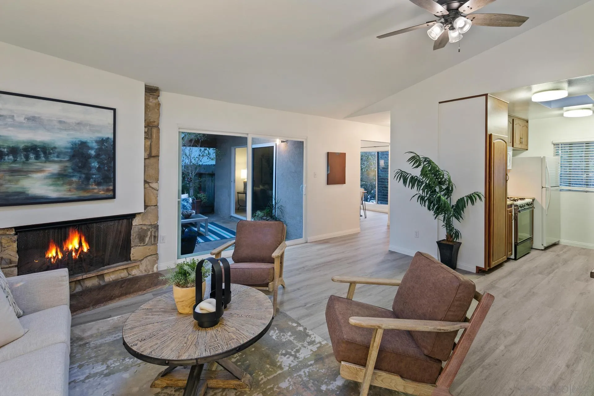 916 Crest Drive Encinitas, CA 92024 - Photo 17 of 47 a living room with furniture and a fireplace