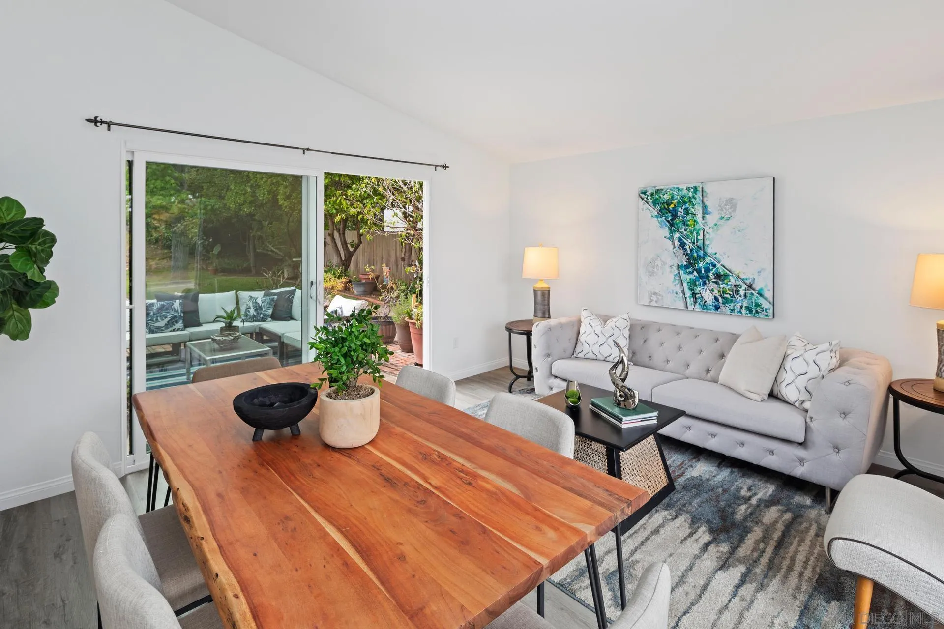 916 Crest Drive Encinitas, CA 92024 - Photo 18 of 47 a living room with furniture and a potted plant