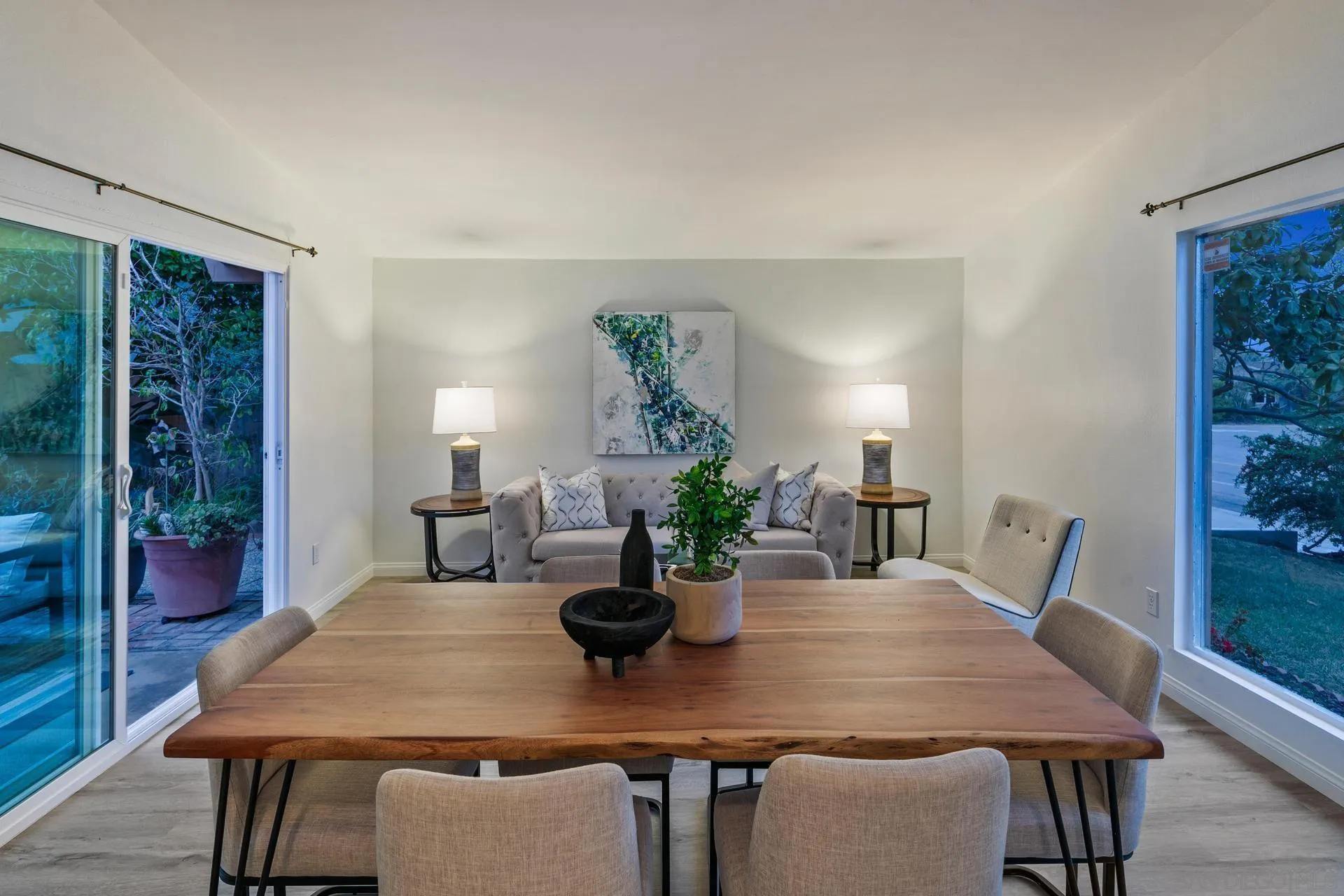 916 Crest Drive Encinitas, CA 92024 - Photo 19 of 47 a view of a dining room with furniture window and wooden floor