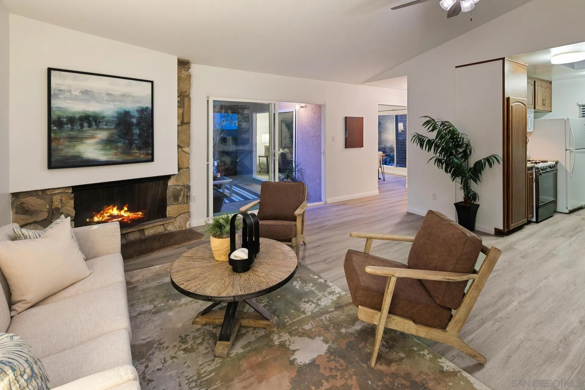 916 Crest Drive Encinitas, CA 92024 - Photo 21 of 47 a living room with furniture and a table