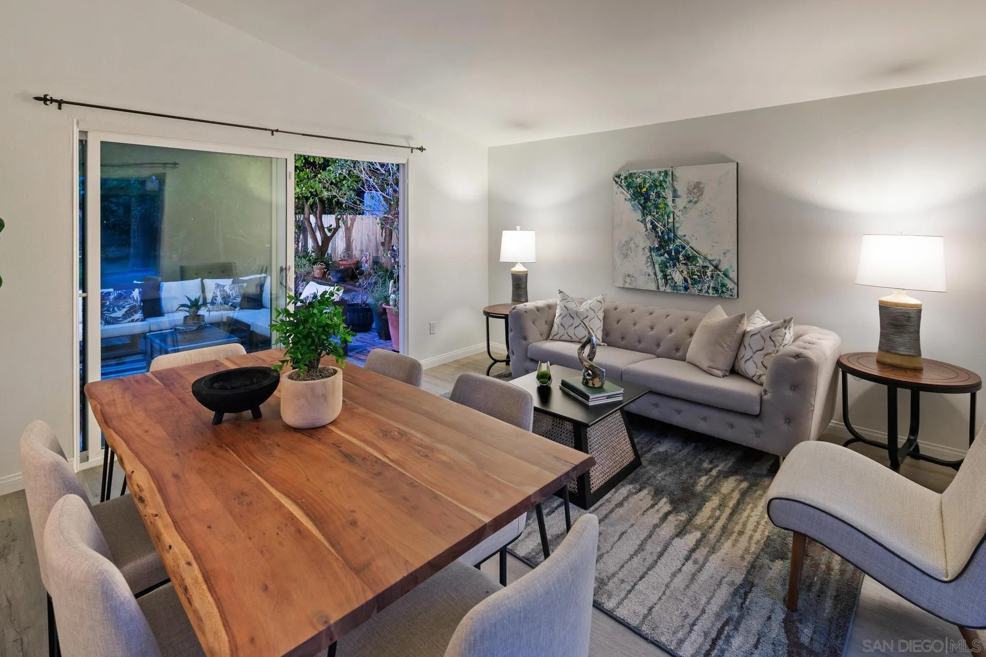 916 Crest Drive Encinitas, CA 92024 - Photo 27 of 47 a living room with furniture and a potted plant