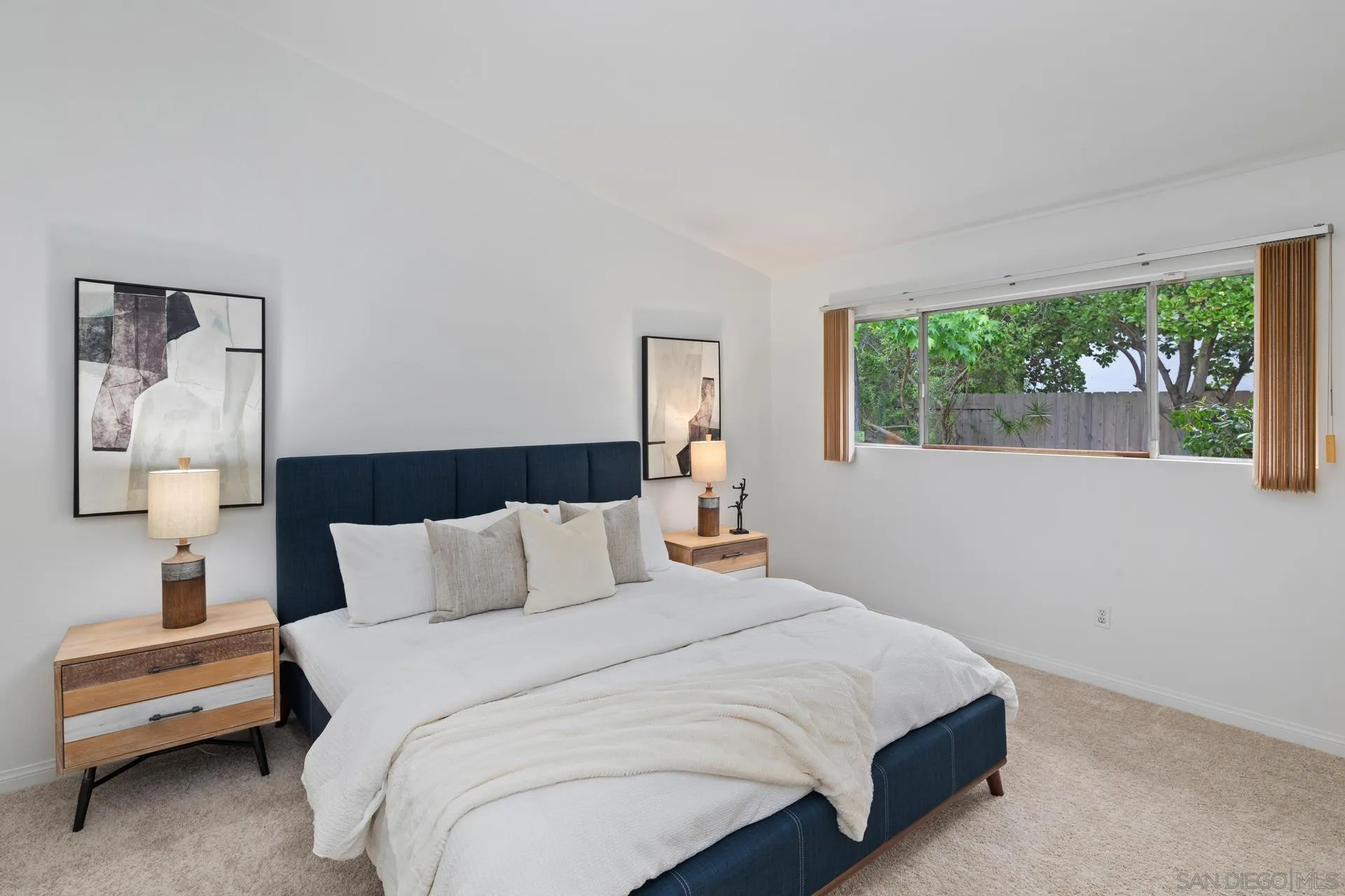 916 Crest Drive Encinitas, CA 92024 - Photo 28 of 47 a bedroom with a bed and a window