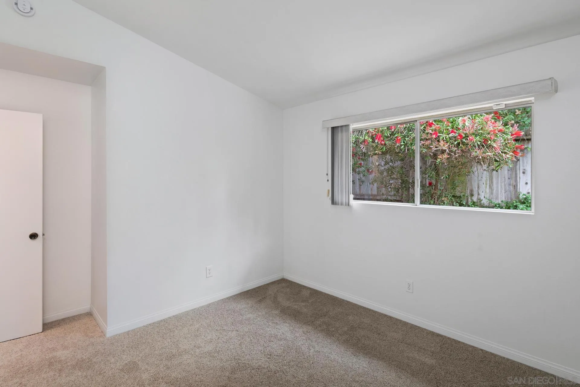 916 Crest Drive Encinitas, CA 92024 - Photo 31 of 47 an empty room with a window
