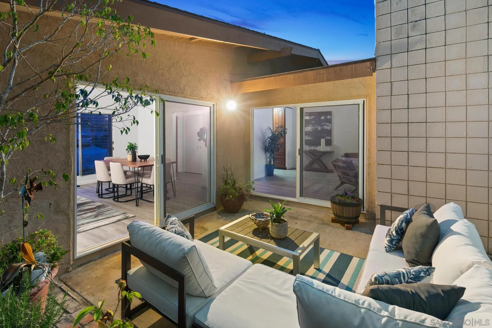 916 Crest Drive Encinitas, CA 92024 - Photo 35 of 47 a view of a patio with couches table and chairs