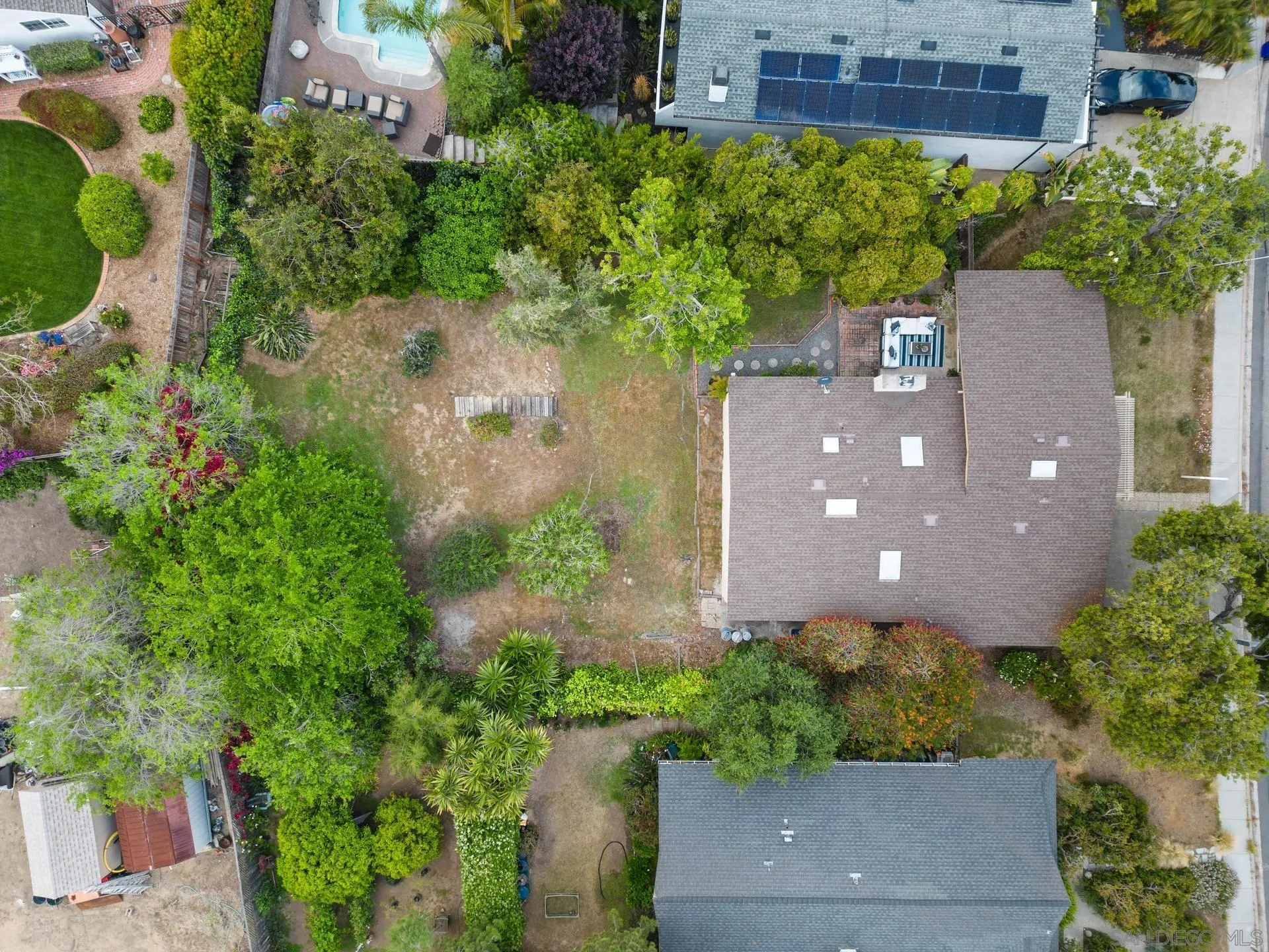 916 Crest Drive Encinitas, CA 92024 - Photo 39 of 47 an aerial view of a house with a yard and a garden