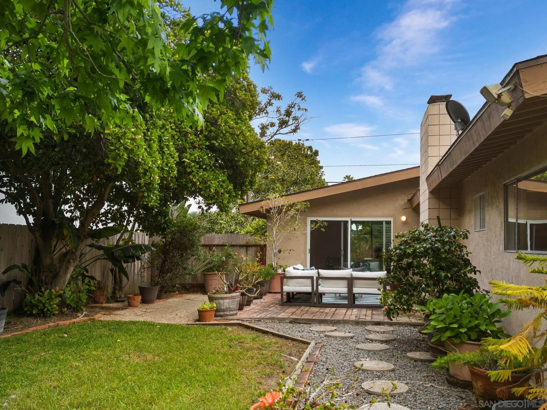 916 Crest Drive Encinitas, CA 92024 - Photo 44 of 47 a view of a house with backyard and sitting area
