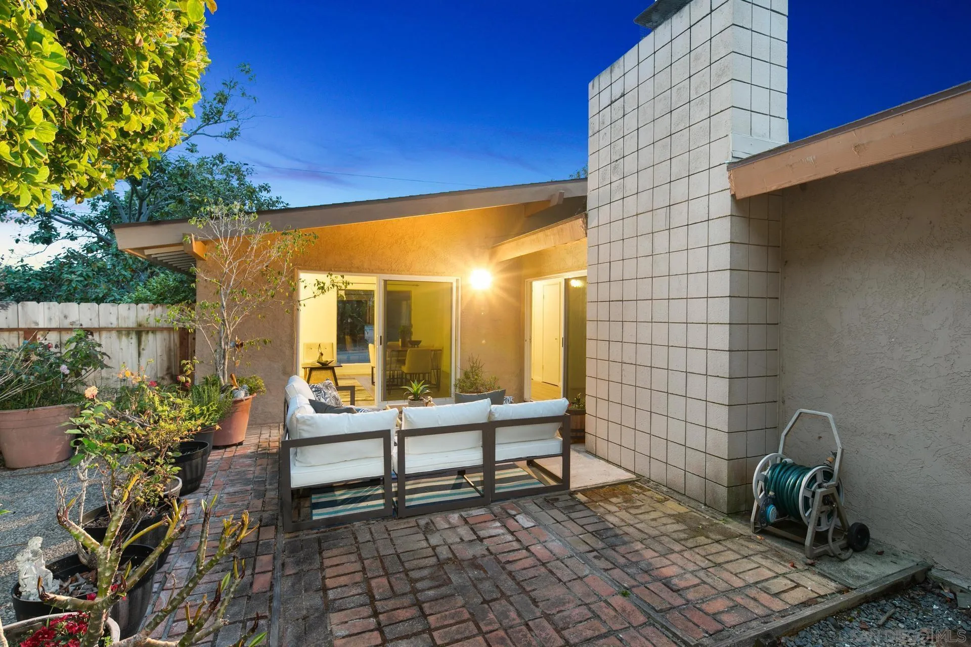 916 Crest Drive Encinitas, CA 92024 - Photo 5 of 47 a balcony with chairs and potted plants