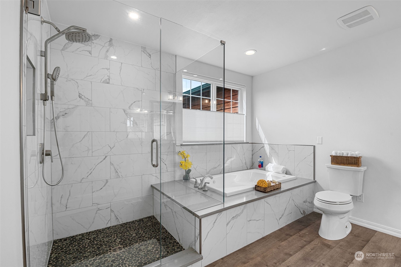 600 North Priest Road Sequim, WA 98382 - Photo 15 of 40 a white bath tub sitting next to a white toilet and sink