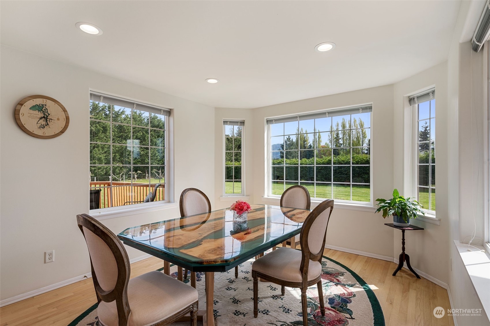 600 North Priest Road Sequim, WA 98382 - Photo 28 of 40 a dining room with furniture garden view and a window