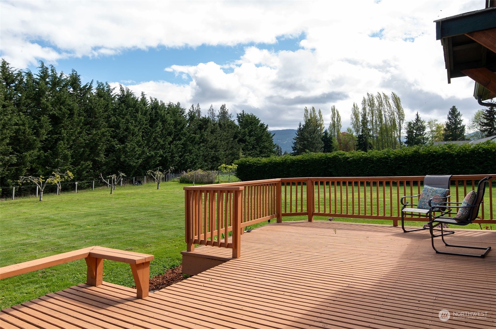 600 North Priest Road Sequim, WA 98382 - Photo 3 of 40 a view of a deck with a yard