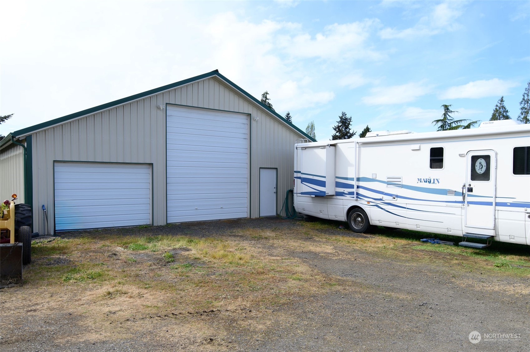 600 North Priest Road Sequim, WA 98382 - Photo 36 of 40 a view of a house with a yard