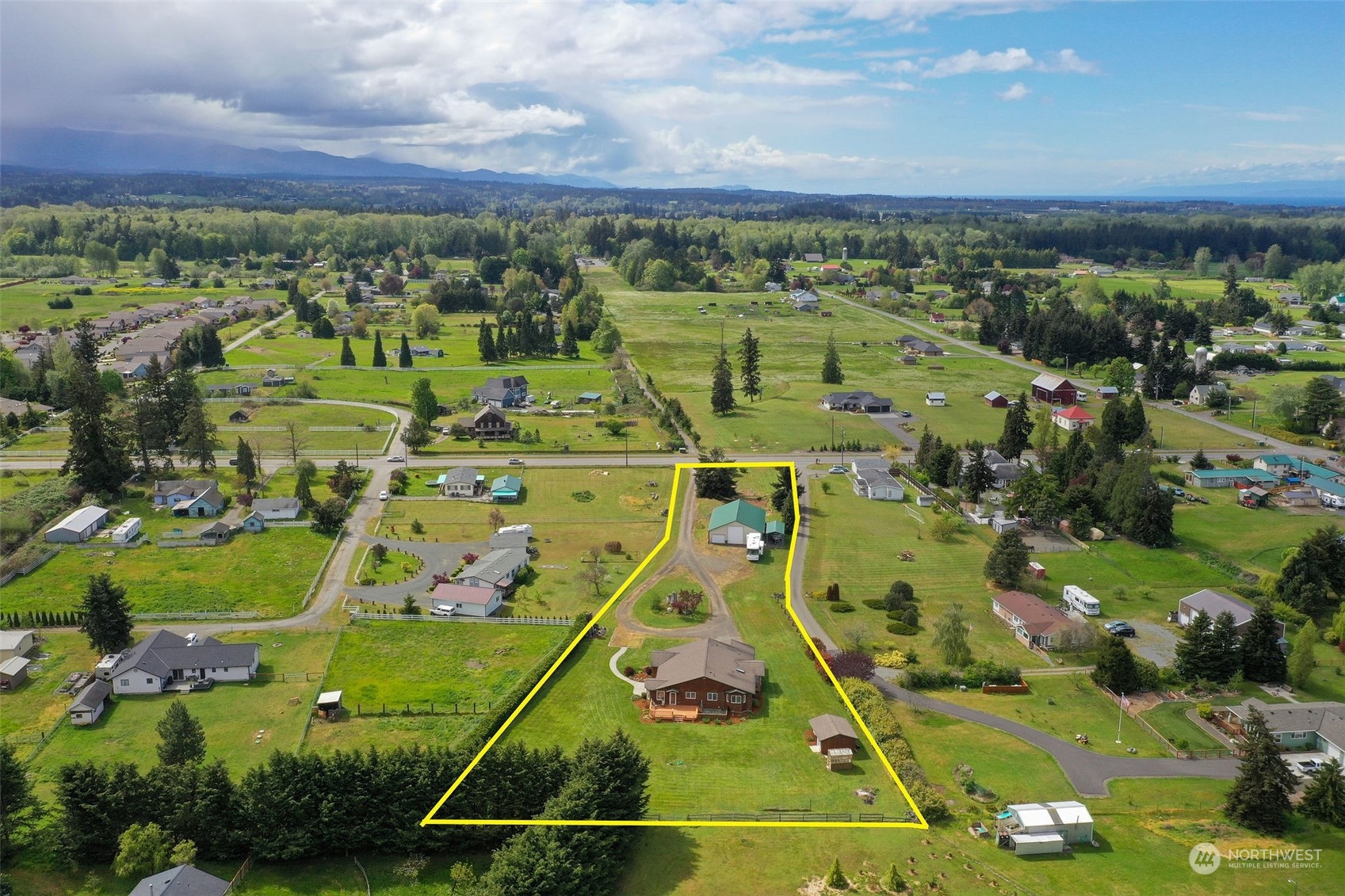 600 North Priest Road Sequim, WA 98382 - Photo 8 of 40 an aerial view of a tennis ground