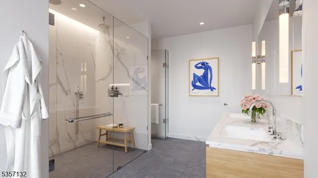a bathroom with a tub sink and mirror
