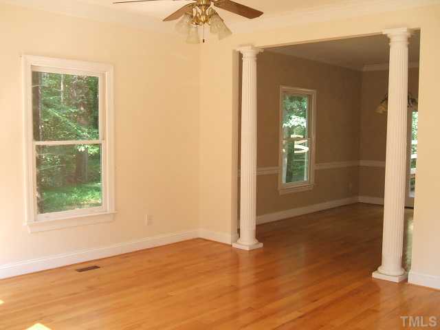 4217 Pope Road Durham, NC 27707 - Photo 3 of 10 an empty room that has a window